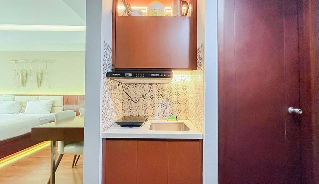 Classic Wooden Touch Studio Room At Apartment Mataram City