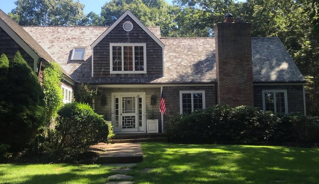 East Hampton village quiet family rental, heated pool, tennis, pets welcome.