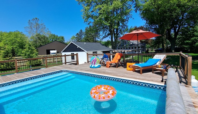 Heated pool hot tub play set screened porch sauna putting green