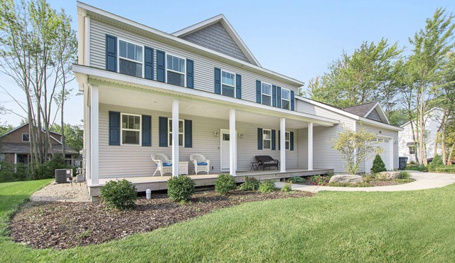 Hot tub, EV friendly, main floor primary suite with plenty of space.