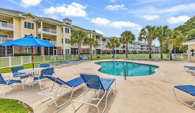 Myrtlewood 2-bedroom condo. Pool in the backyard