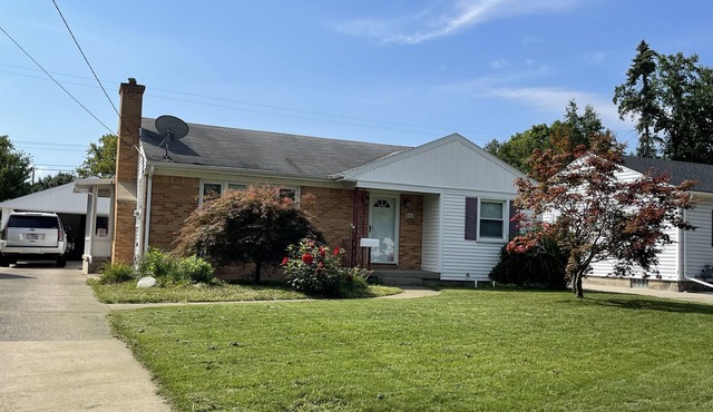 NE Executive Home close to all things Grand Rapids in highly desirable NE GR!