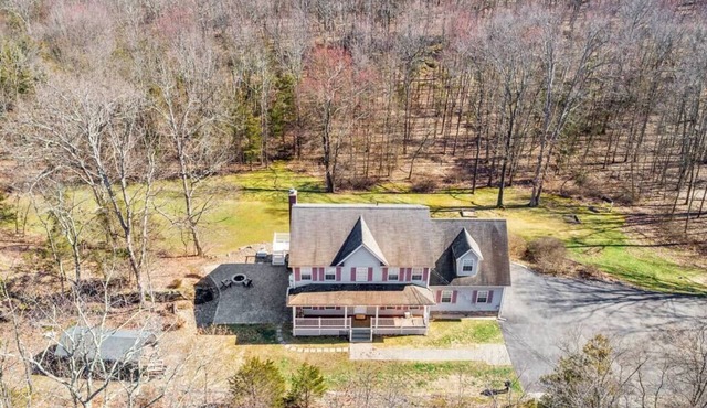 Peace and Privacy at 5 BDRM Villa Set on Wooded Lot