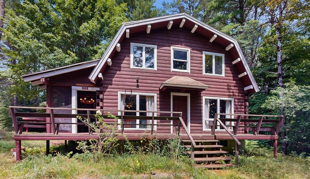 Rustic, dog-friendly cabin with deck, screened porch.