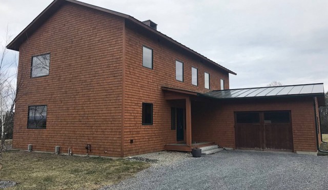 Spacious waterfront home w/phenomenal lake views, fireplace, & shared dock