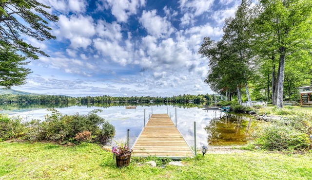 Stunning lakefront, open concept home with beautiful yard & porch - dog-friendly