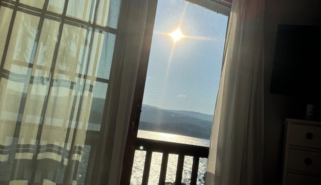 Superb waterfront house on Newfound Lake private beach, boathouse & deck