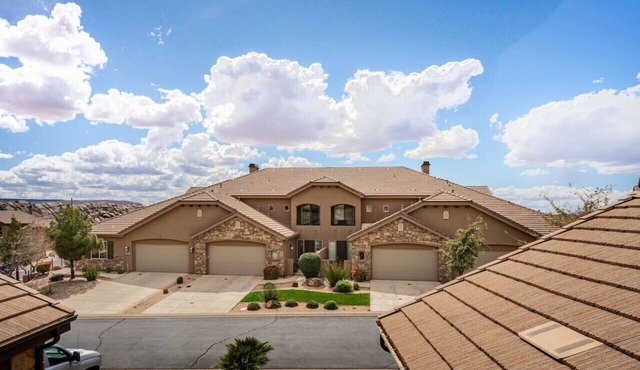 Two heated pools/spas, pond, backyard w/BBQ
