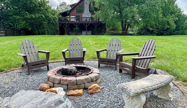 Waters Edge Riverfront Cabin | Hot Tub, Firepit & New River Views for the Whole Family