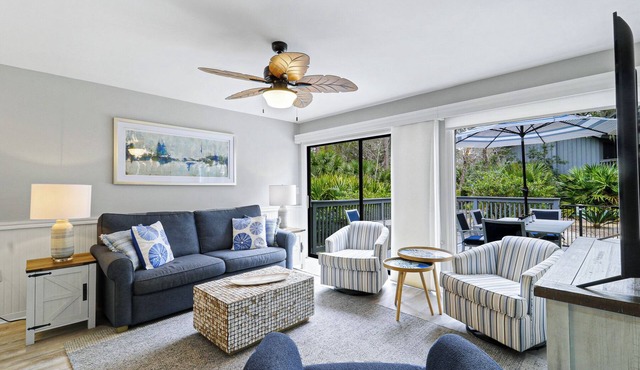 Wonderful 2 bed 3 bath villa steps away from community pool and beach.